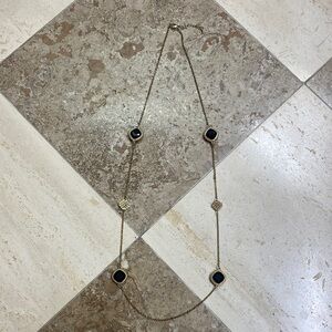 Elegant Gold Tone and Black Necklace